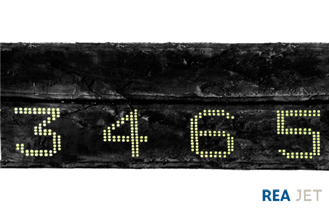 Foto: 16-nozzles Large Character marking system - Marking of green rubber for internal logistics