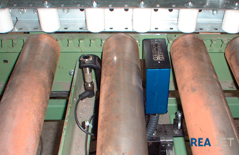 Foto: REA JET - High Resolution printing system - contact-free marking of wood